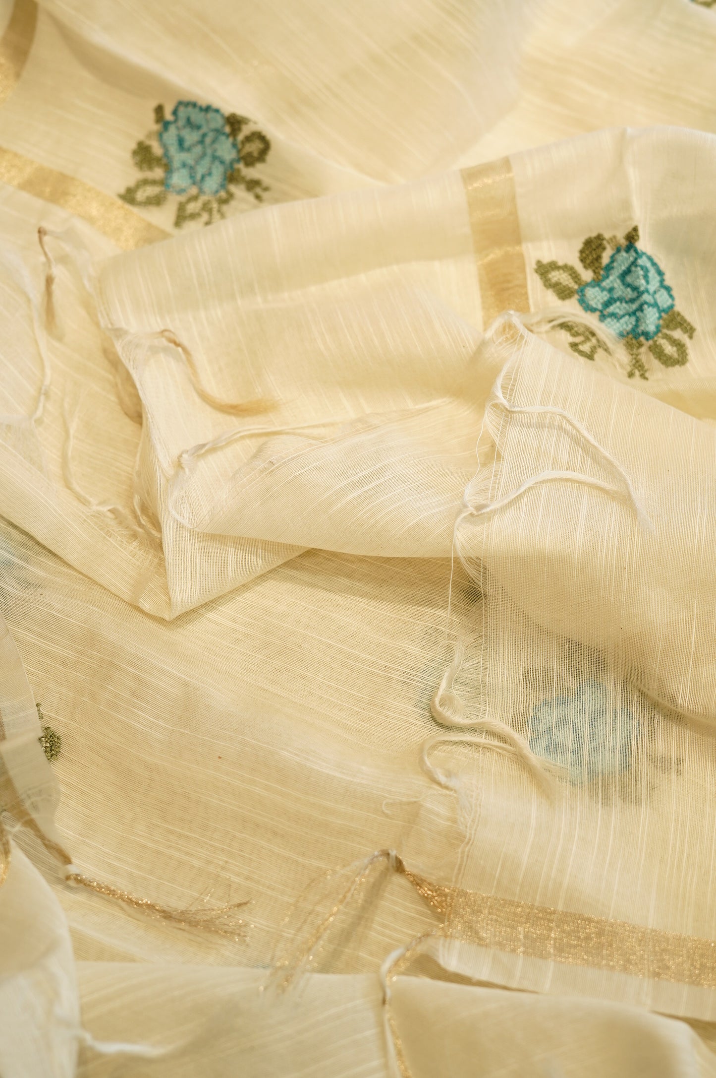 Off White Mul Chanderi Embroidered Suit